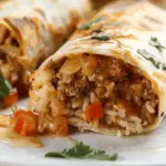 Cheesy Ground Chicken and Rice Burritos