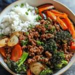 Spicy Ground Beef Stir-Fry Bowl with Garlic Veggies & Steamy Rice